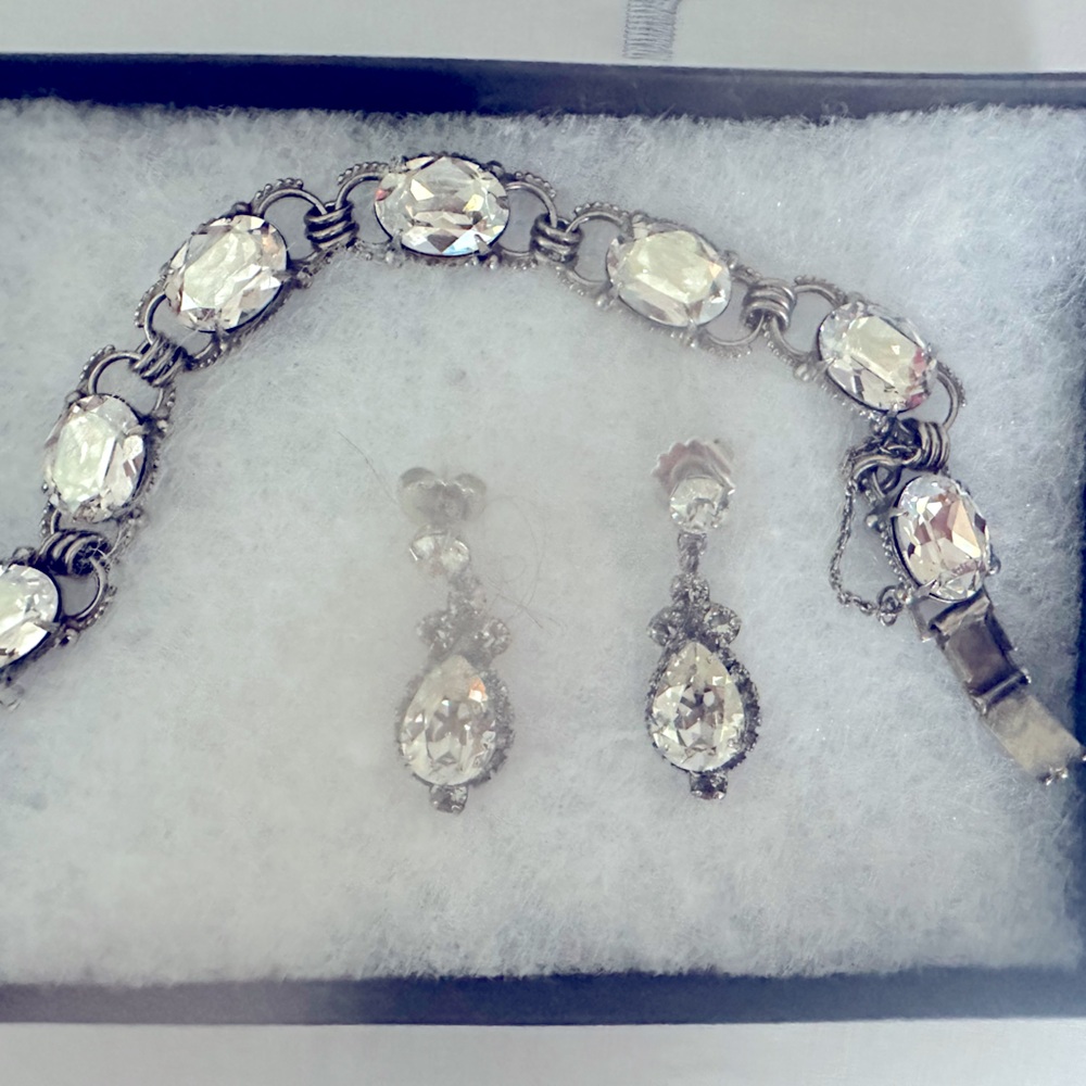Like new bracelet and matching earings purchased from Bloomingdales